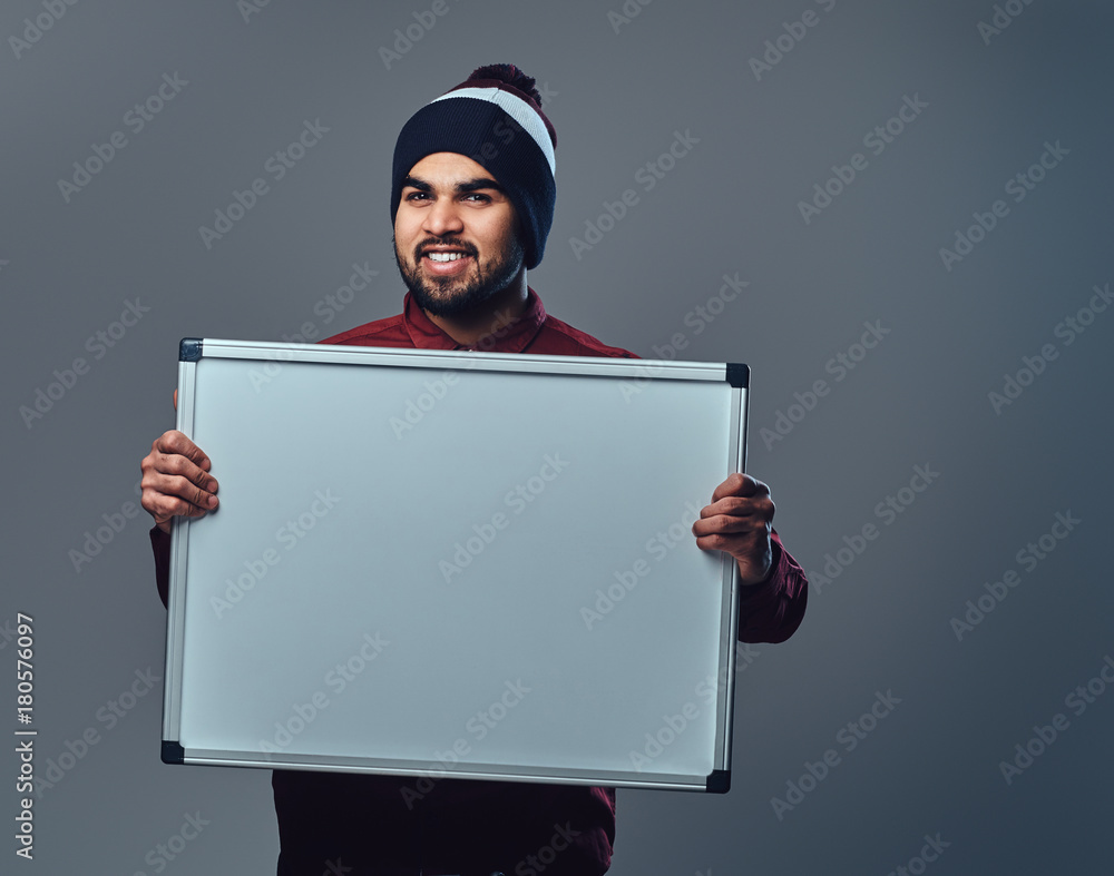 A man holds white empty desk for commercial text here. A man holds white empty desk for commercial text here.