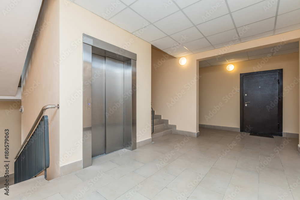 Naklejka premium Elevator and stairs