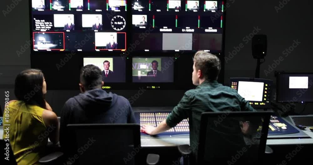 Operators in a control room at a television studio