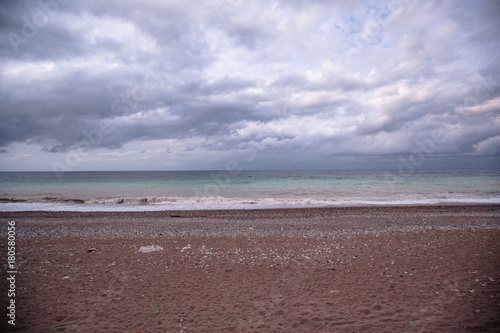a long gray sky over the beach