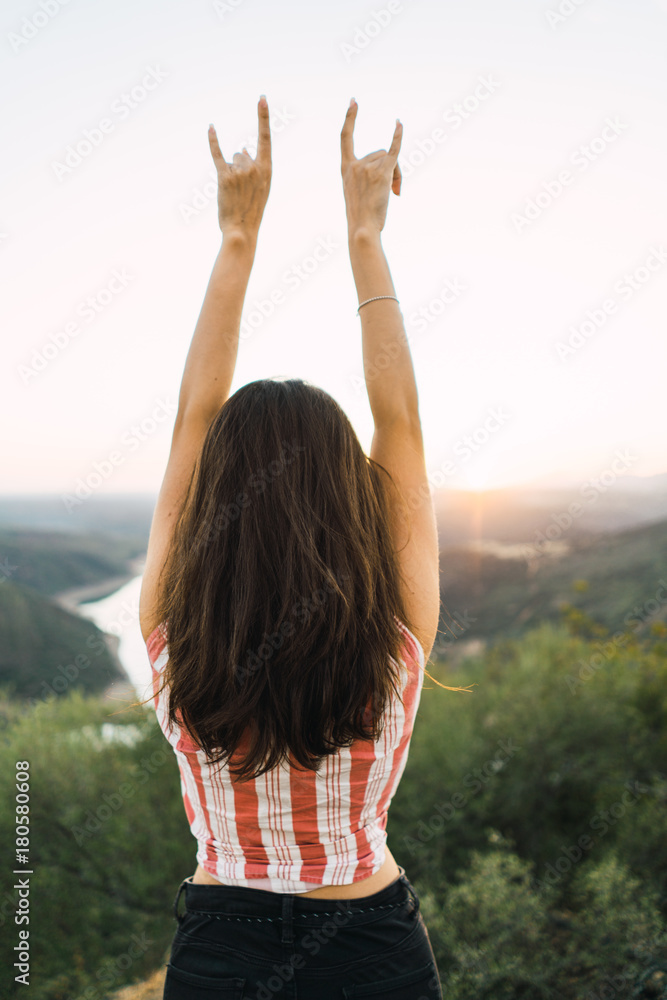 Cheerful woman in bright light on nature Cheerful woman in bright light on nature