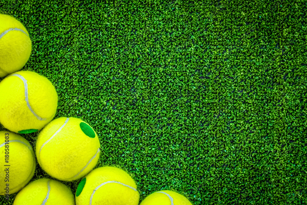 tennis ball on green background top view mock up