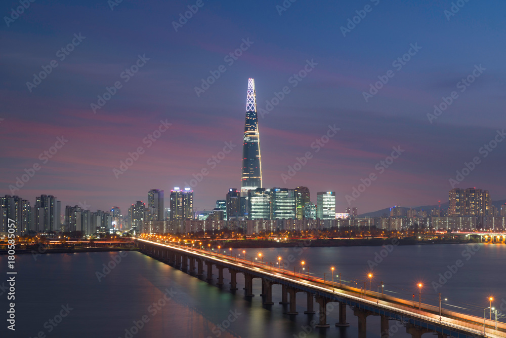 Seoul twilight sky sunset with Lotte tower at Han river in Seoul city, South Korea