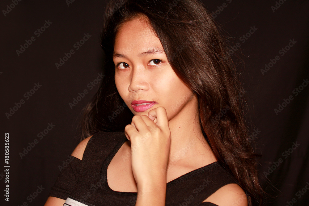 Young pretty Filipina model looking at the camera Young pretty Filipina model looking at the camera
