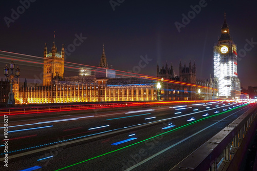 Night scene with light trails on the Westminster bridge. Big Ben and House of Parliament in London  The United Kingdom of Great Britain.