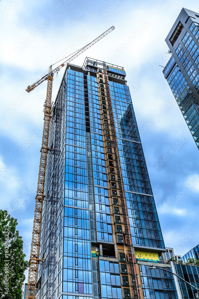 Crane and Elevator on New Construction Tower Crane and Elevator on New Construction Tower