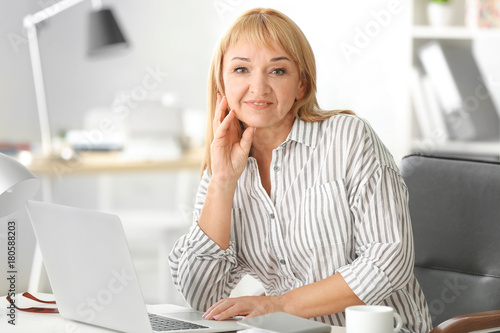 Beautiful mature woman work...
