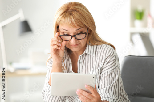 Beautiful mature woman with...