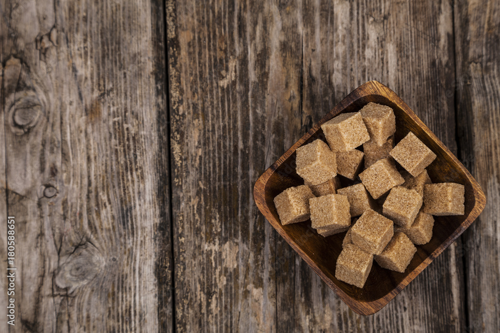 Bowl with cubes of cane sugar Bowl with cubes of cane sugar