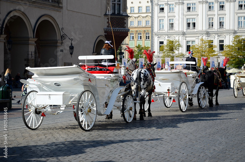 Cab on the main square - old town in Krakow, Poland