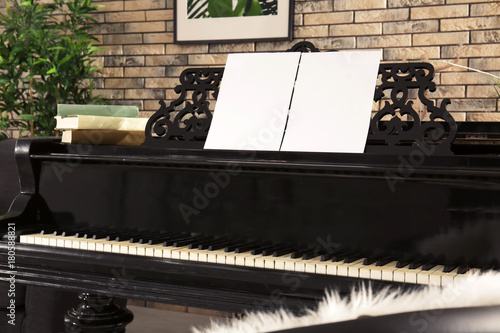 Grand piano in cozy home in...