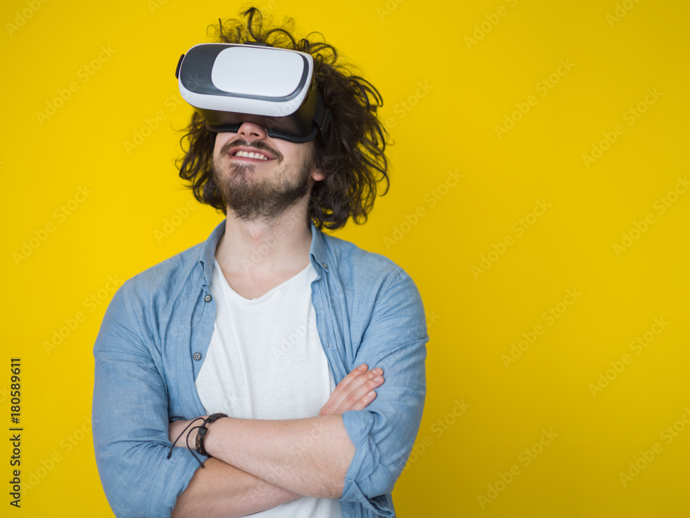 handsome man using VR headset glasses of virtual reality handsome man using VR headset glasses of virtual reality