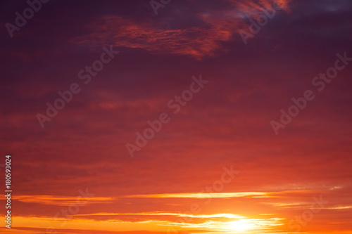 Fiery, orange and red colors sunset sky. Beautiful background © es0lex