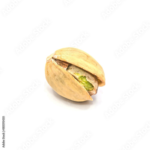 One whole open pistachio nut isolated on white background.