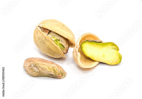Pistachio nuts. Open, halves. Isolated on white background.