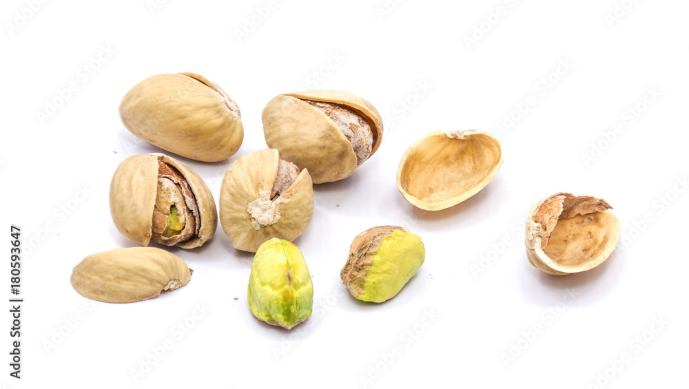 Group of pistachio nuts isolated on white background. Group of pistachio nuts isolated on white background.