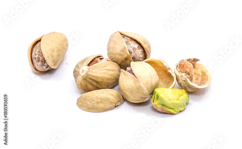 Group of pistachio nuts isolated on white background.