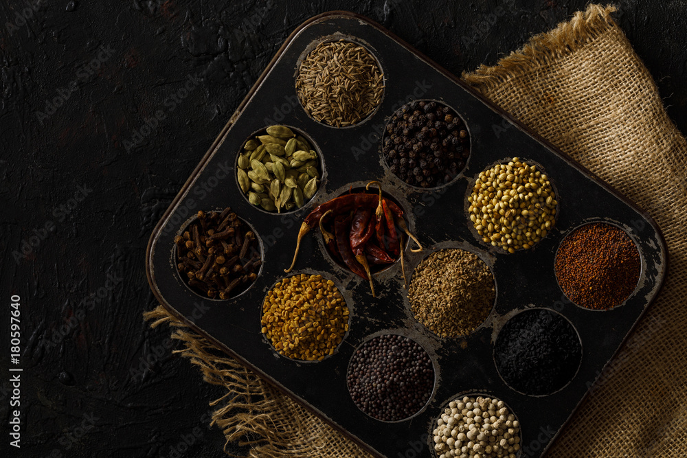 Indian Spices / Masala Box on a Black Background. With jute. Stock Photo |  Adobe Stock