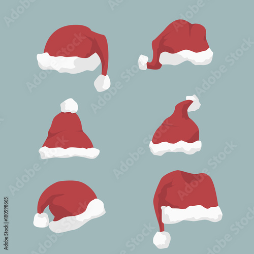 Christmass pattern of santas hats on blue background
