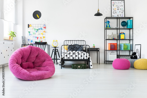 Pink pouf in kid's room