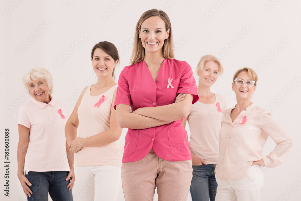 Obraz premium Women with pink ribbons