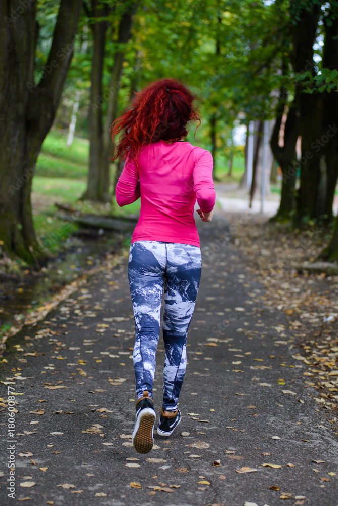 Healthy lifestyle young sporty woman running at park Healthy lifestyle young sporty woman running at park