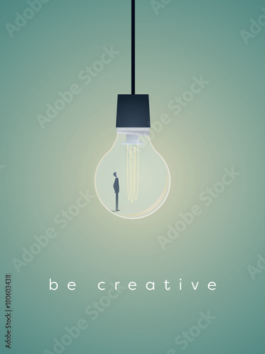 Business creativity vector symbol with businessman standing in lightbulb.