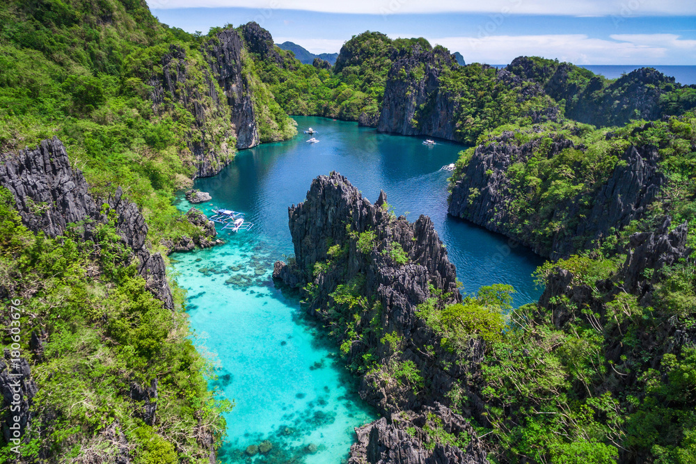 Coron, Palawan, Philippines, aerial view of beautiful lagoon and limestone cliffs. 