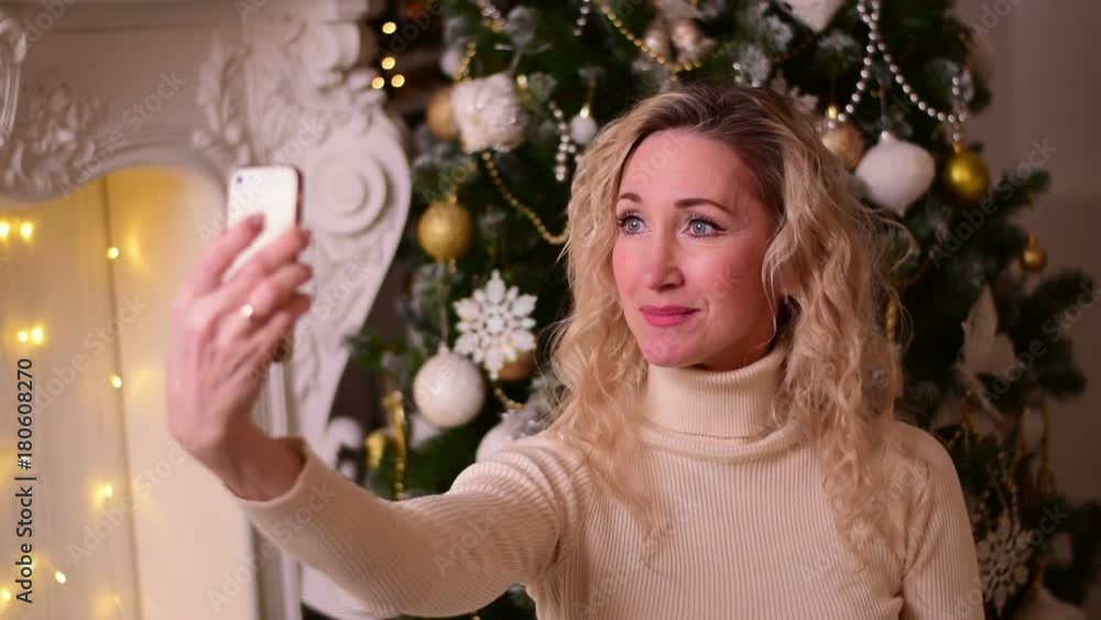 Woman doing selfie on phone
Woman doing selfie on phone