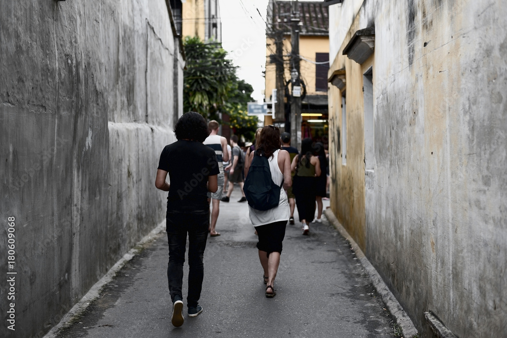 Tourists visit Hoi An ancient town