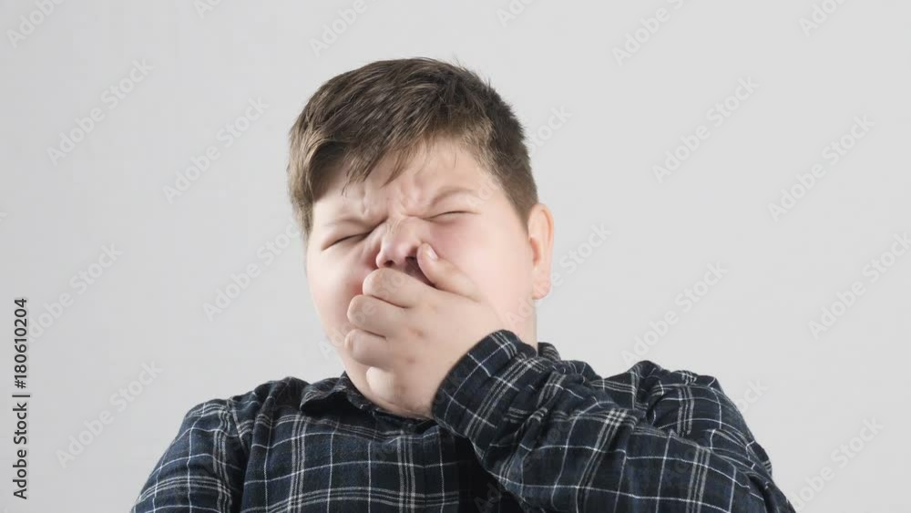 Young fat boy tired, wants to sleep and yawns 50 fps Young fat boy tired, wants to sleep and yawns 50 fps