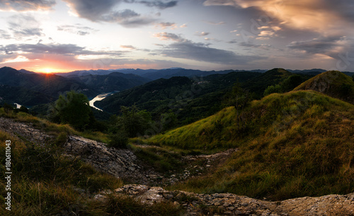 Above Garaventa: Panoramic view on the Lake at Sunrise with a beautiful deep cloudy Sky, Lago del Brugneto, Parco dell'Antola, Liguria,  Italy, Europe