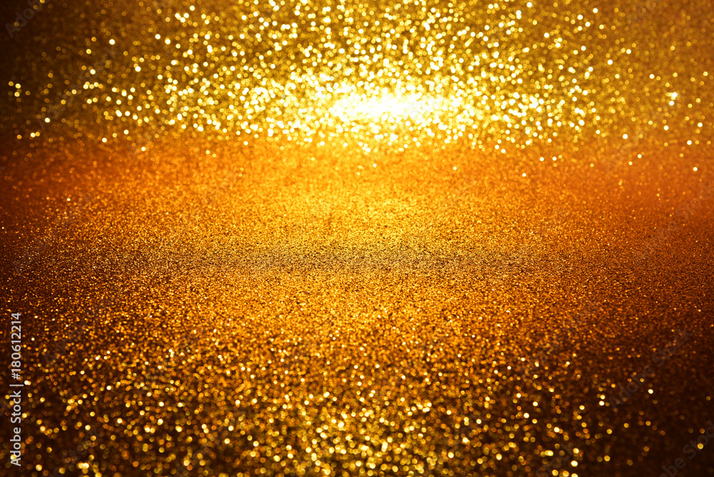 Gold glitter vintage lights texture background. defocused
