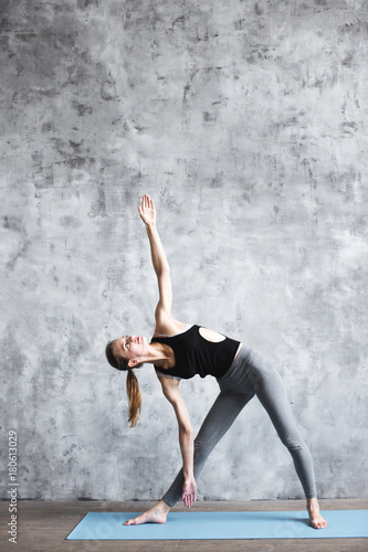 Woman practice in in fitness club. Yoga concept.