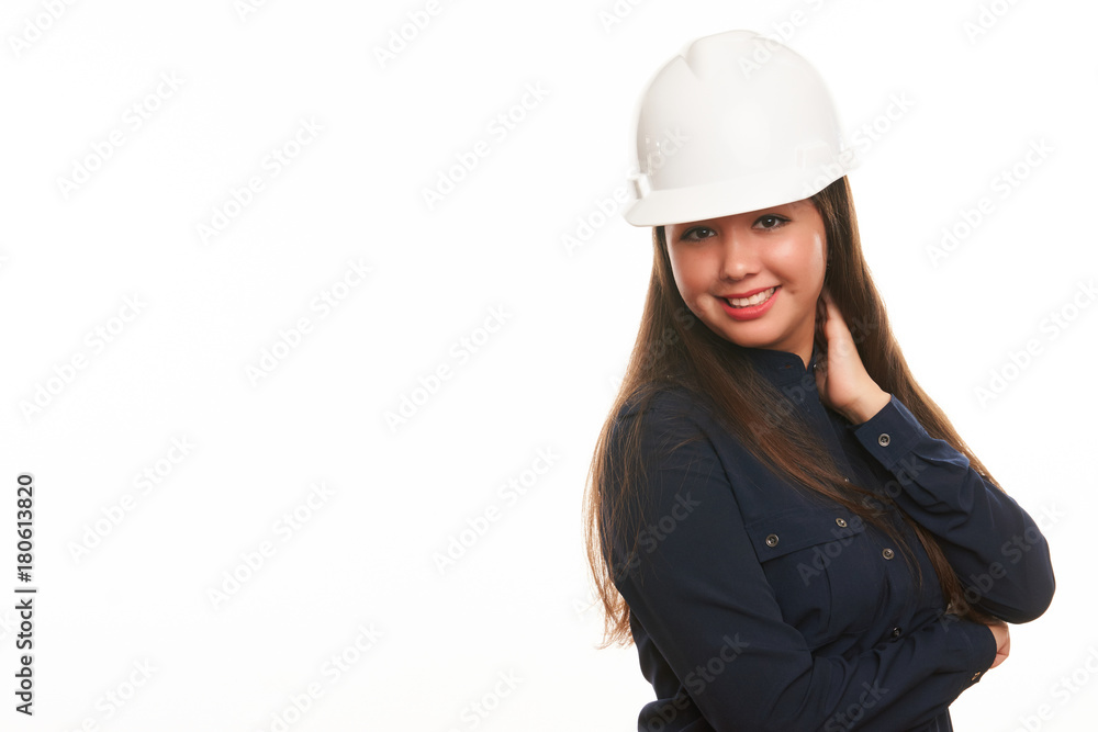 Smiling Business woman engineer in protective hard hat