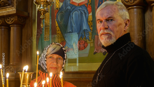 Elderly married couple in orthodox church