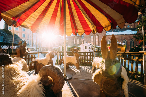 Vintage Old Carousel On Christmas Market On The Dome Square In R