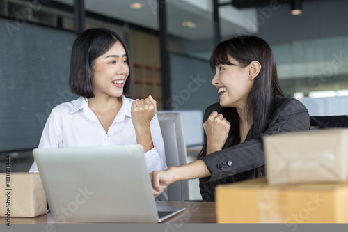 Young Asian Woman working with smiling together, Young Owner Woman Start up for Business Online, SME, Delivery Project, Woman with Online Business or SME Concept.