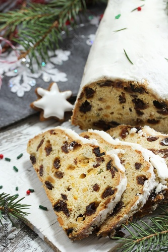 Christmas Stollen  on festive Xmas holiday background with copy space