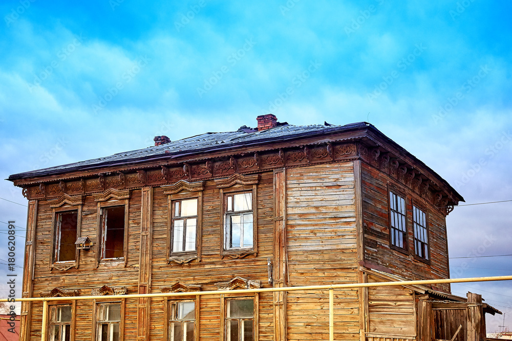 old wooden house with broken windows old wooden house with broken windows