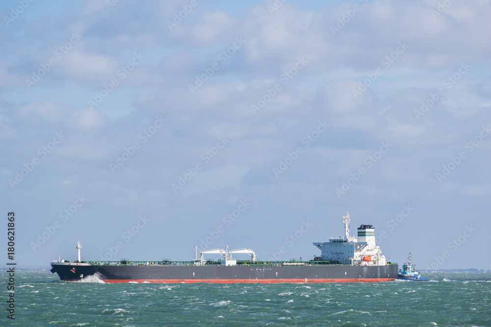 Oil tanker sailing on the Solent bound for Fawley. For the Esso refinery the biggest in Europe. Oil tanker sailing on the Solent bound for Fawley. For the Esso refinery the biggest in Europe.