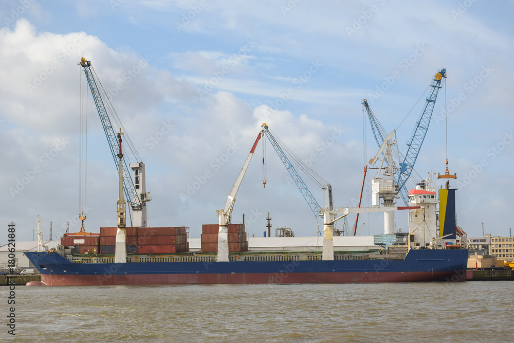 Multipurpose cargo vessel in the port of Hamburg, Germany.