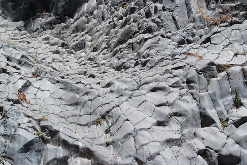 rock in alcantara river sicily photo