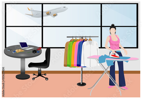 the lady pressing cloth in the room