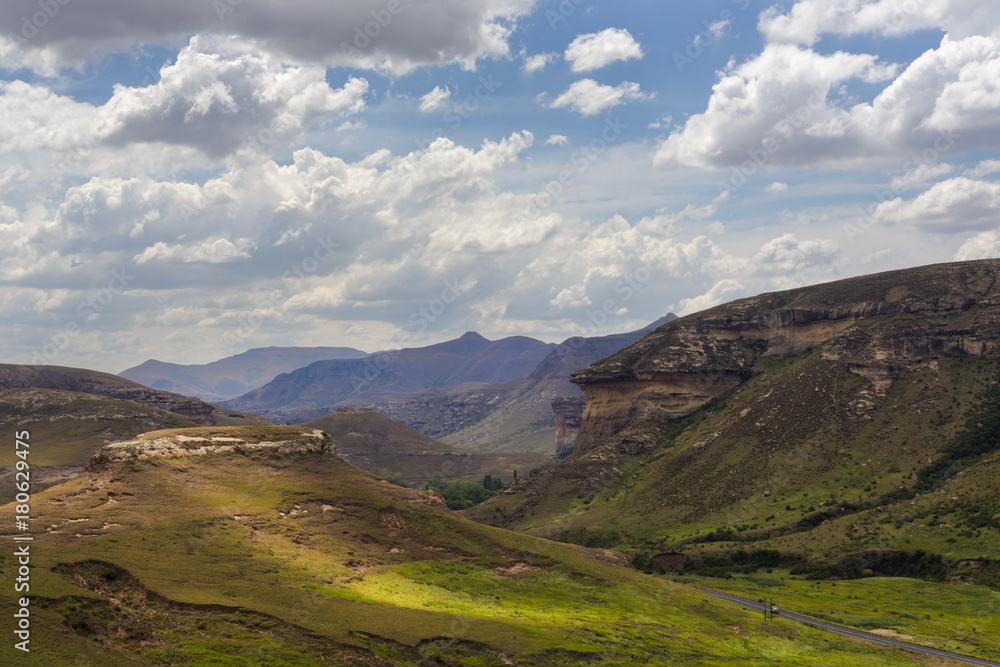 Sandstone formations and clouds