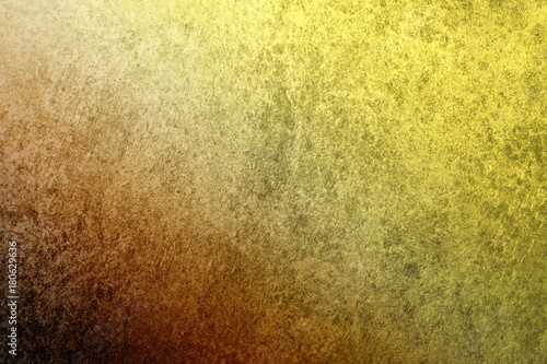 A textured vintage stucco background with a dark blue to golden yellow gradient photo