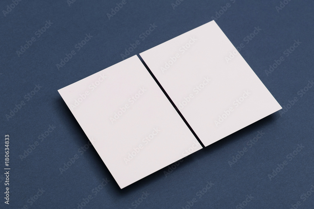 Blank white business card postcard flyer on a blue background Blank white business card postcard flyer on a blue background