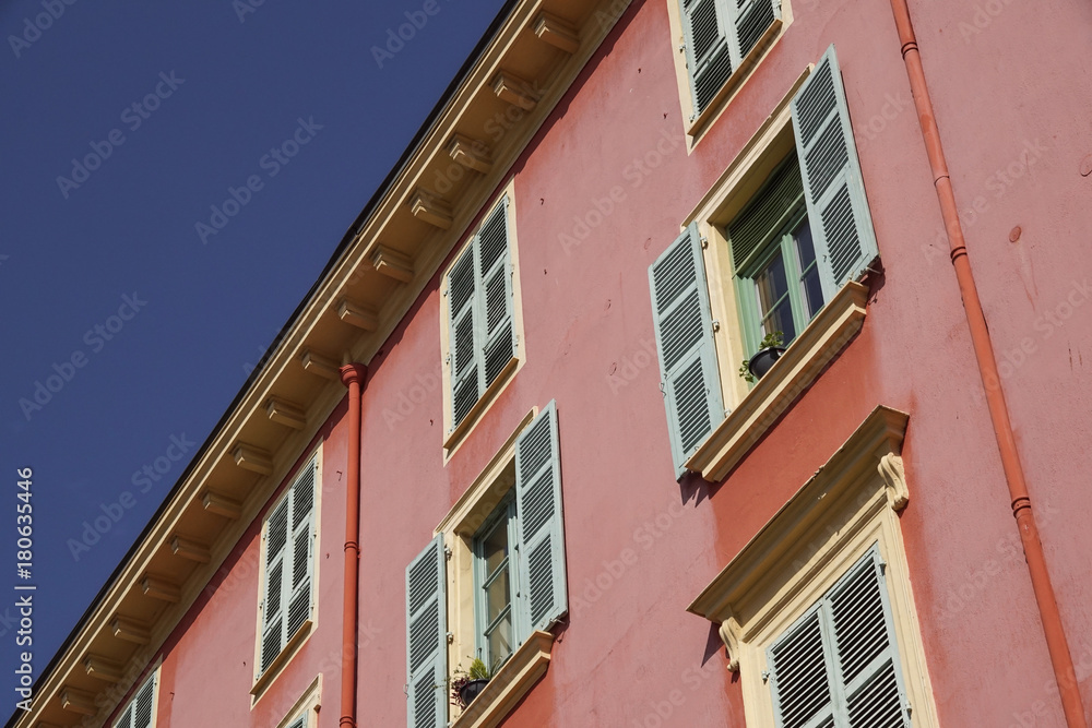 Obraz premium Pink building with blue sky for background