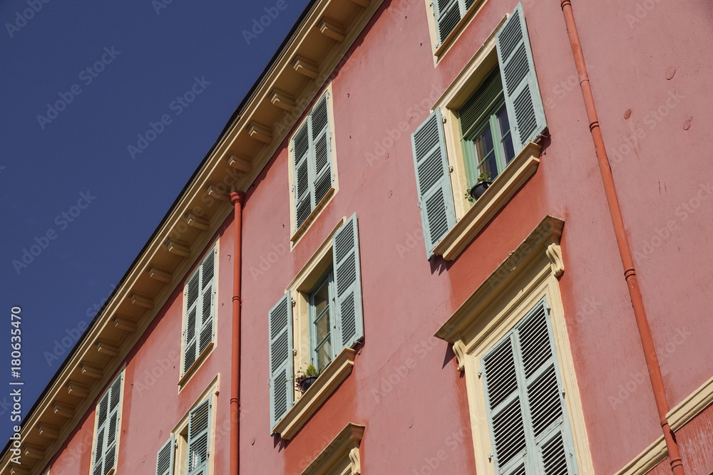 Pink building with blue sky for background
