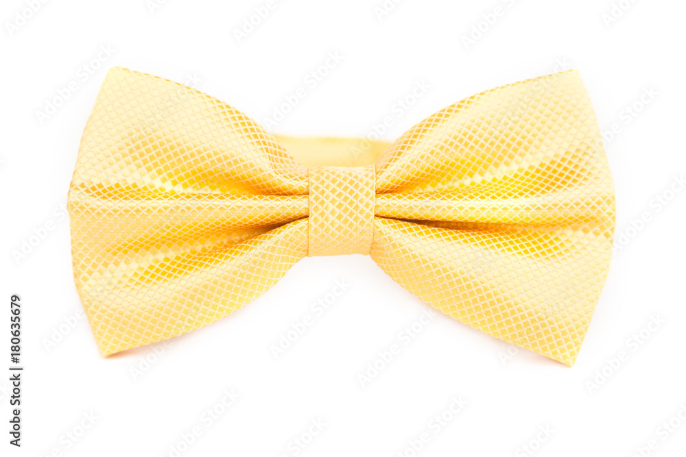 bright yellow tie bow in front of white background